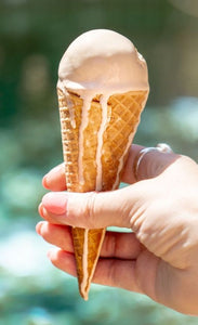 Elato ice cream melting in a cone